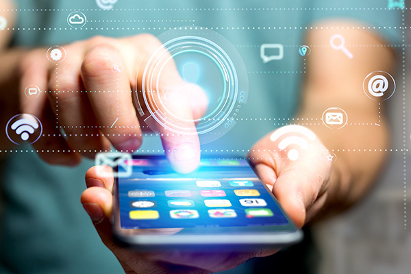 View of a person using a smartphone with a Contact icon surrounding by app and social icon