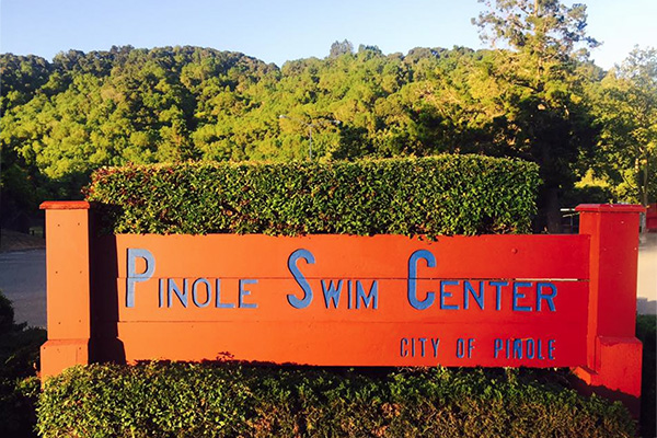 Pinole Swim Center city of Pinole sign