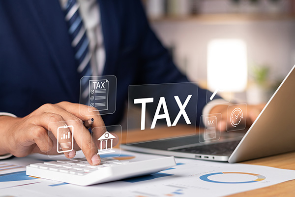 person doing tax calculations