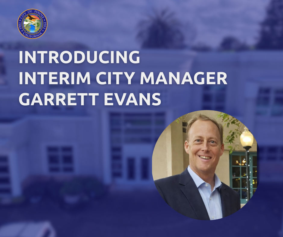 blue graphic and man with blonde hair in suit