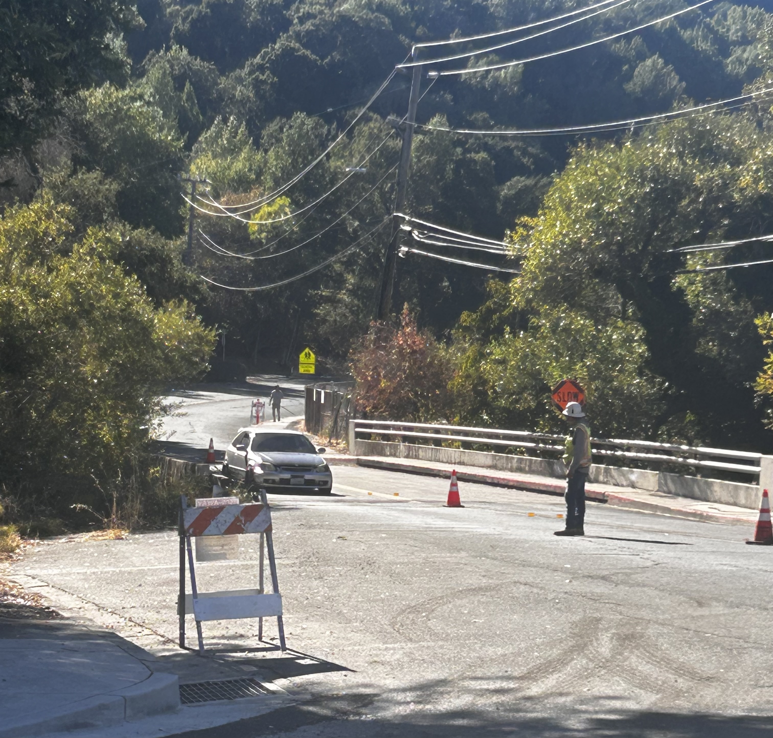 road construction worker holding sign